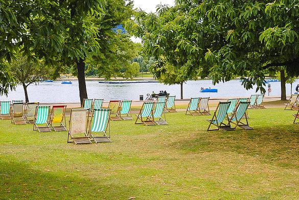 An image of a lawn with deck chairs in London’s Hyde Park