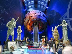 An image of sculptures of the earth and a large globe at the London Natural History Museum