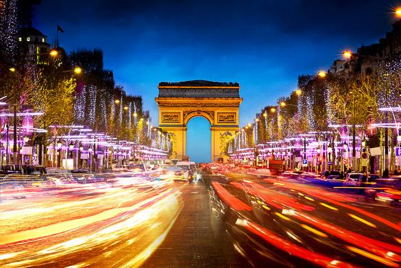Image of the Champs Elysées decorated with holiday lights in Paris