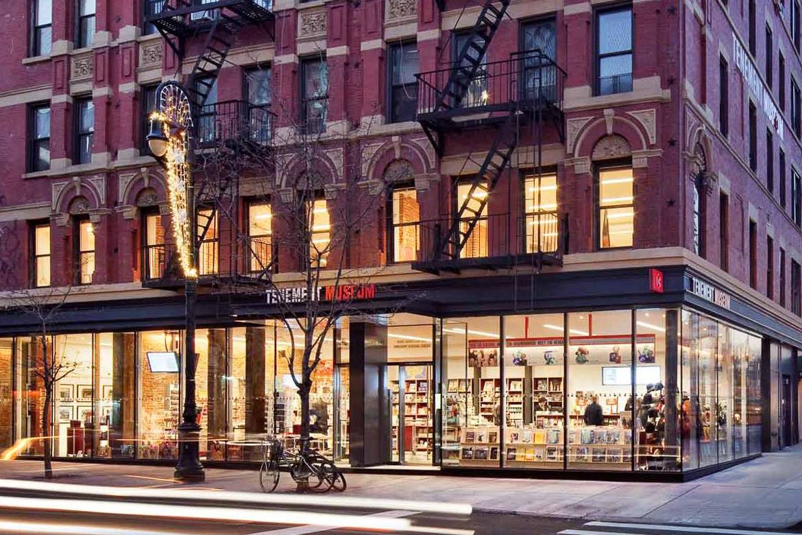 Picture of the Tenement Museum draped with lights