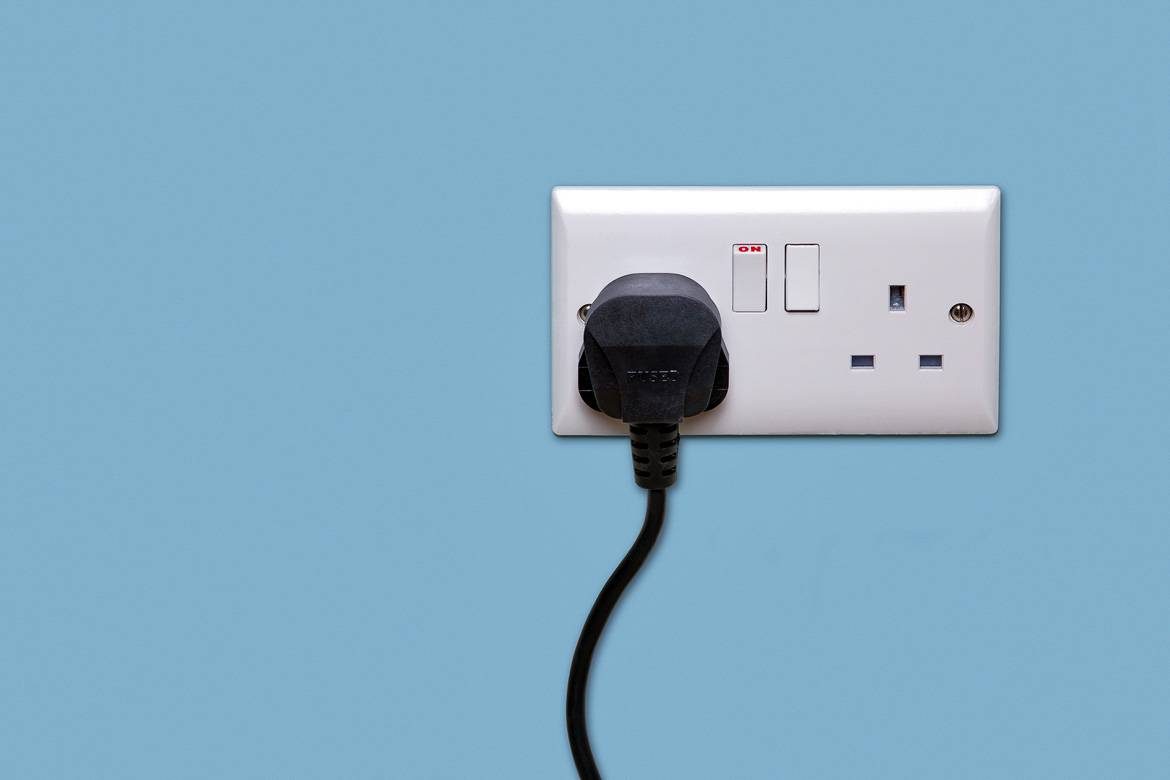 Photo of a three-pin plug.