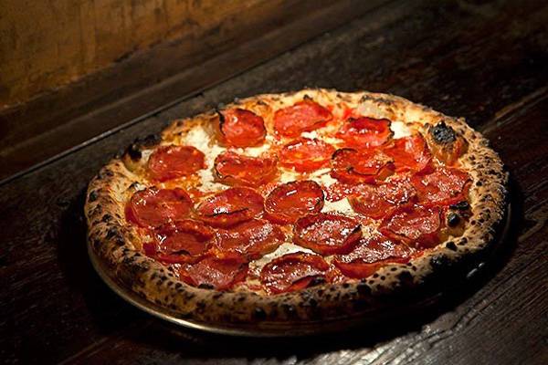 Picture of a pepperoni pizza at Paulie Gee’s.