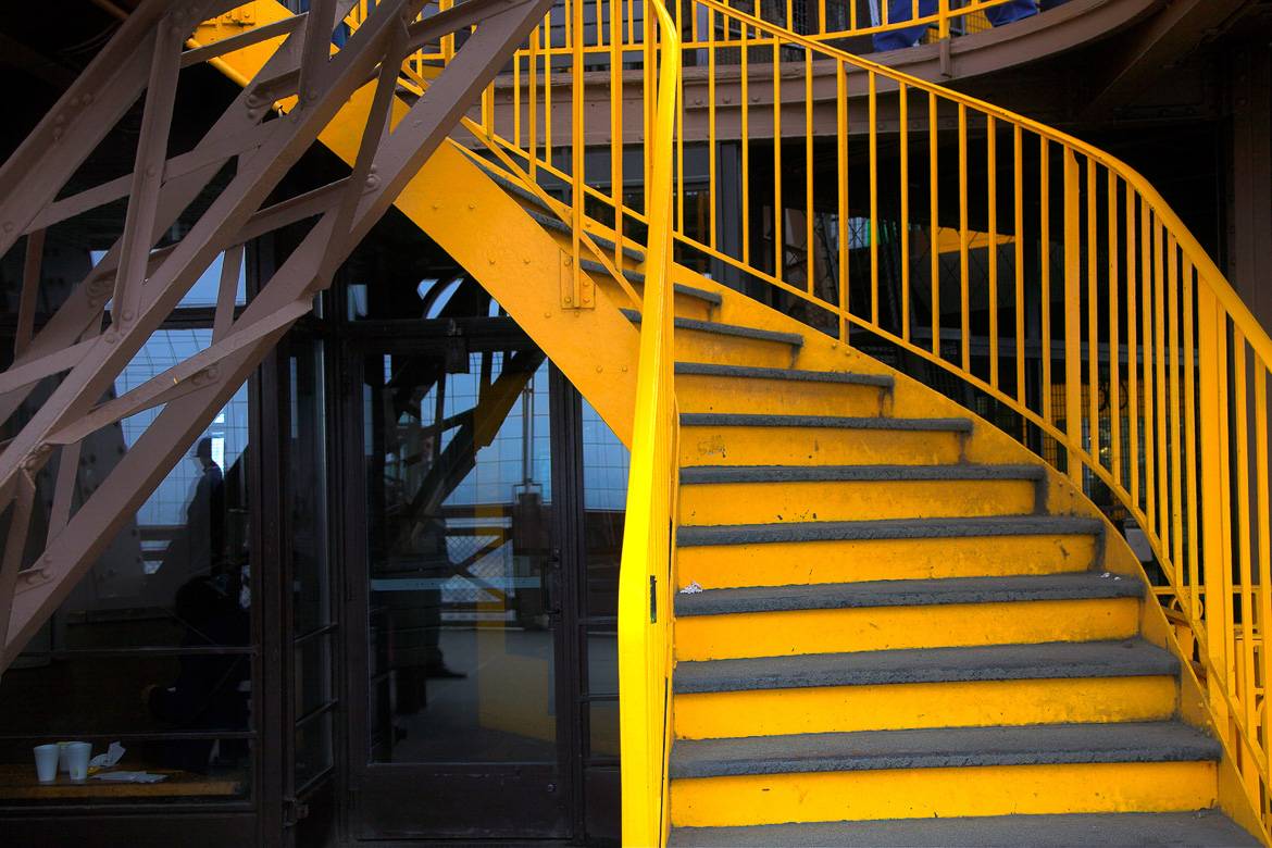 Eiffel Tower stairs in yellow