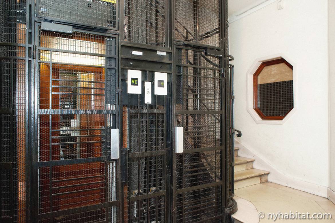 Paris elevator shares space with stairs