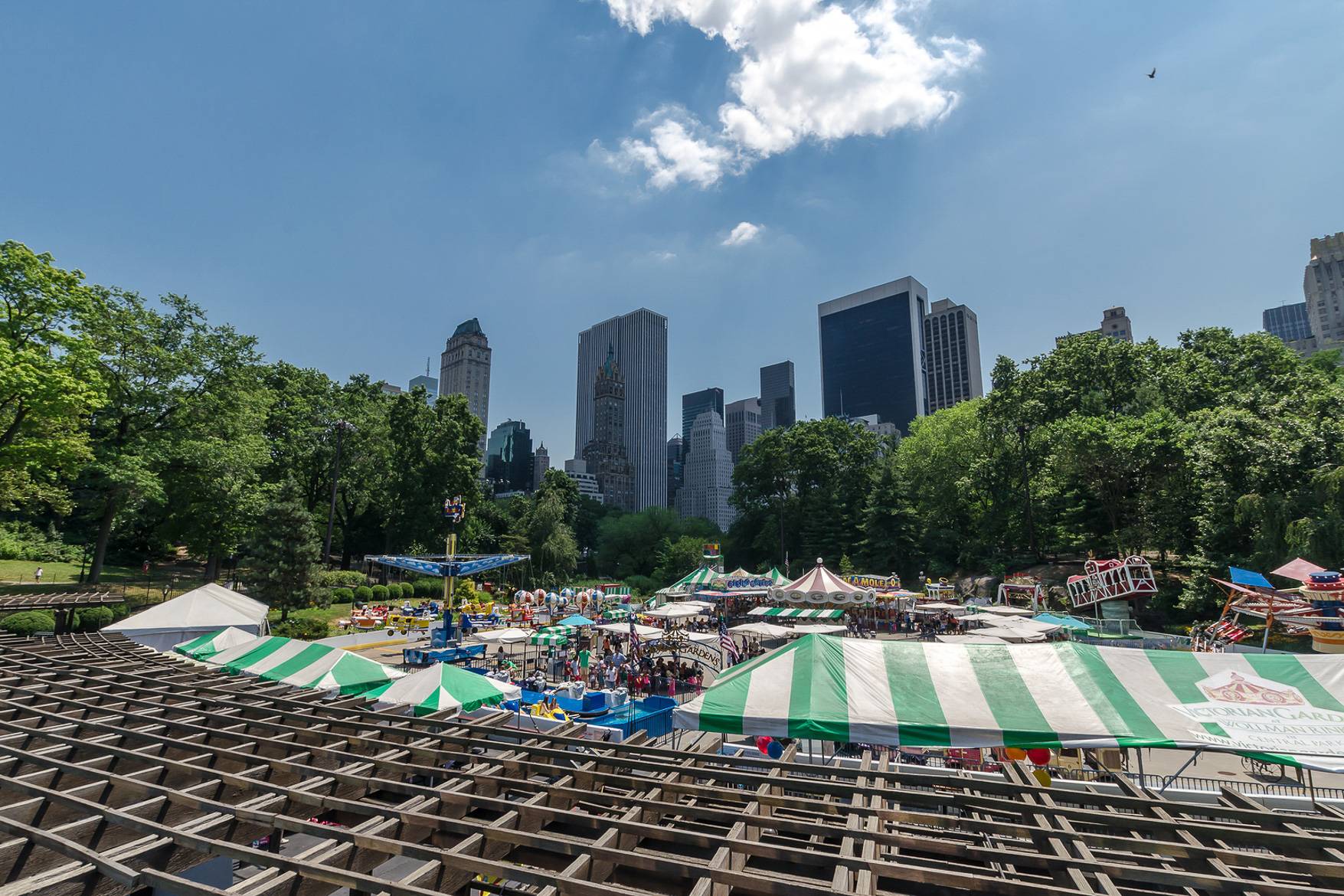 Image of an amusement park set up in Central Park