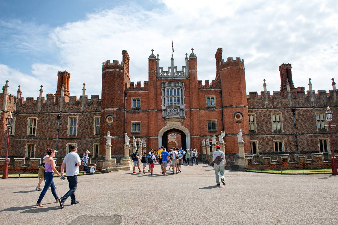Image of the front entrance of Hampton Court Palace on a sunny day