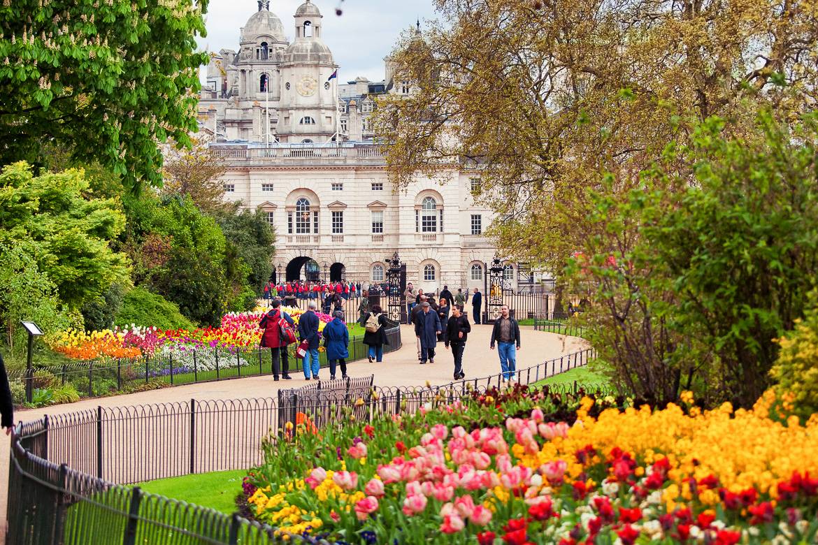 Image of people walking towards St. James Palace in St. James Park