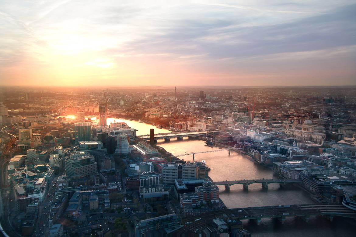 Image of The Shard skyscraper in front of the river Thames on a clear day