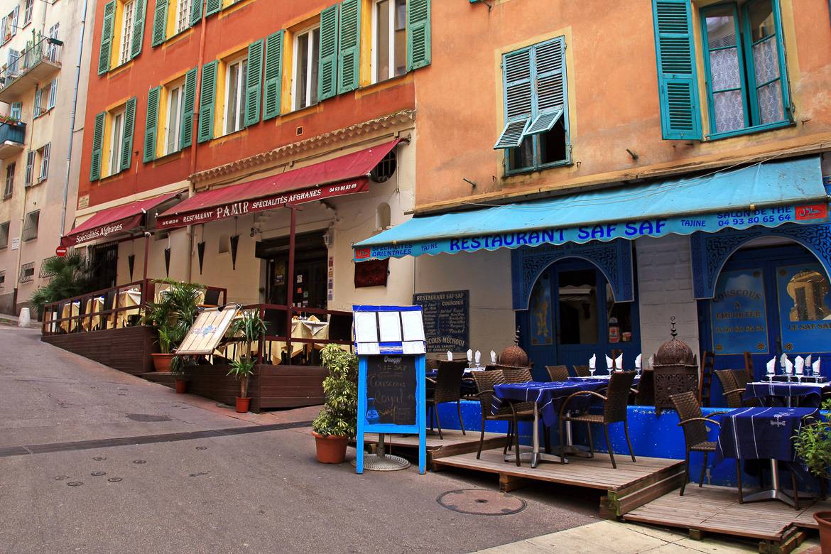 Image of street cafés in a Southern French town