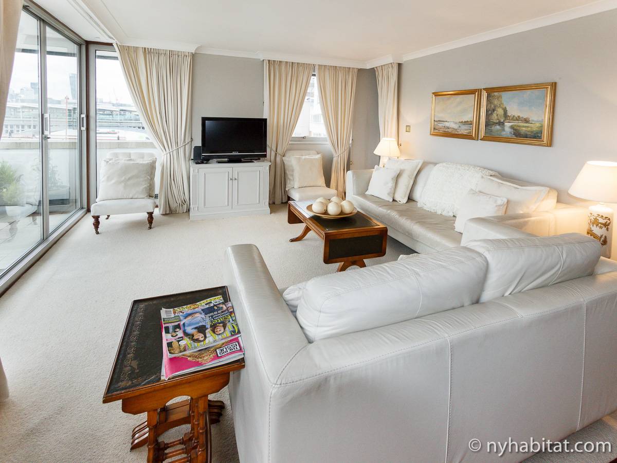 This modern apartment features floor-to-ceiling windows, providing a great view onto the Thames River [LN-528]