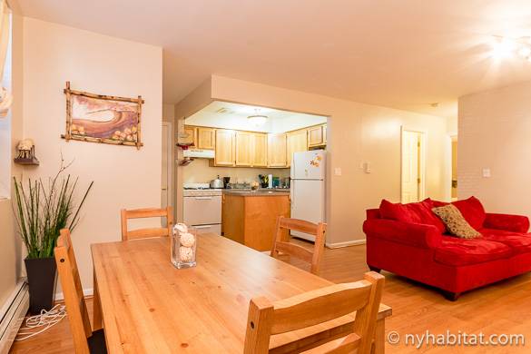 Image of kitchen, dining table, and living room sofa in NY-15298
