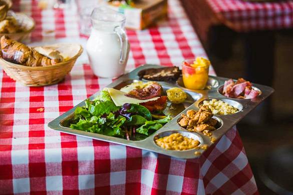 Image of a tray of food at La REcyclerie in Paris’s 18th arrondissement