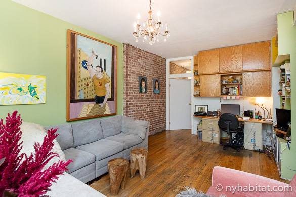 Image of living room of NY-16533 with colorful walls and chandelier