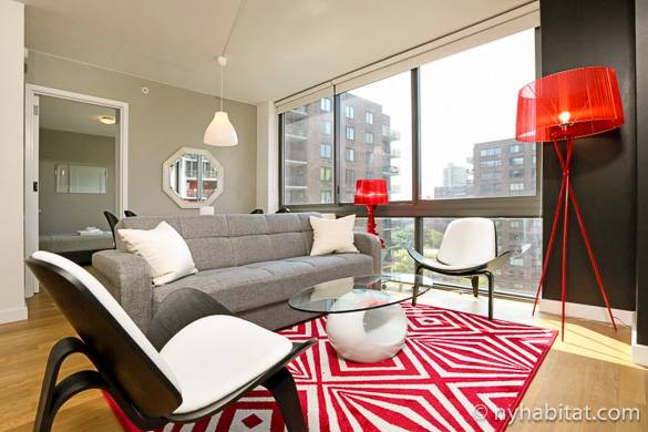 View of living room of NY-16820 with city views out the window in the background