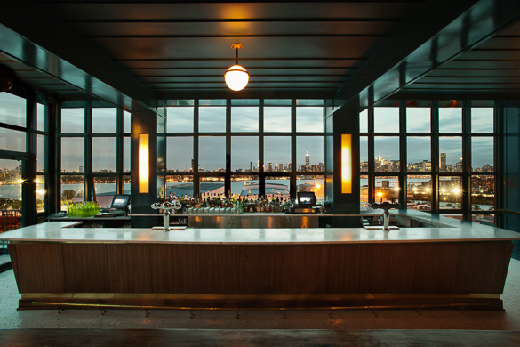 Image of the Wythe Hotel bar with Manhattan view