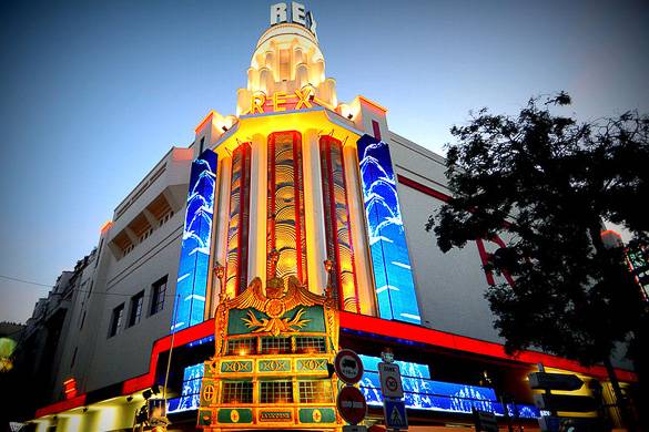 Image of the neon lights and art deco exterior of Le Grand Rex cinema