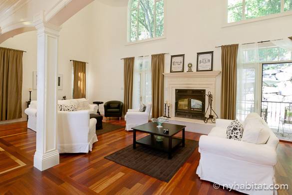 Image of living room of NY-15040 in Staten Island with large picture windows with greenery outside