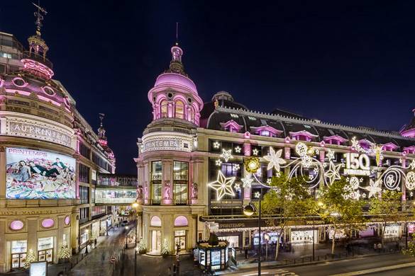 Image of Paris department store Printemps with pink and white Christmas lights outside