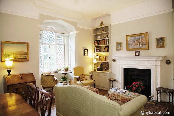 Image of living room of LN-1666 with sofa in front of fireplace
