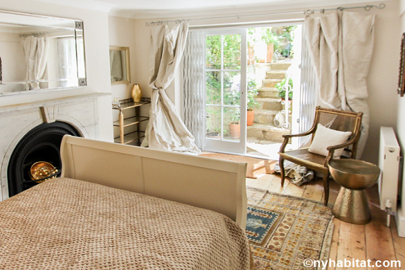 Image of bedroom of LN-1725 in Primrose Hill with French doors opening to a terrace