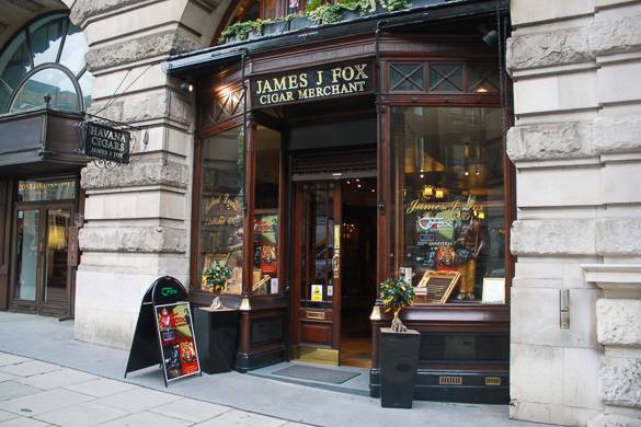 Image of the display windows of James J Fox, a cigar merchant