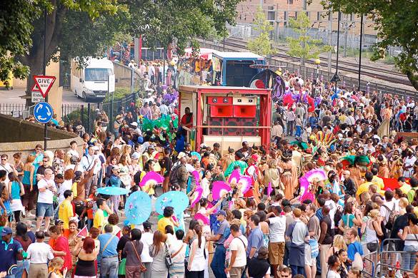Image of spectators and people in costumes at Notting Hill Carnival.