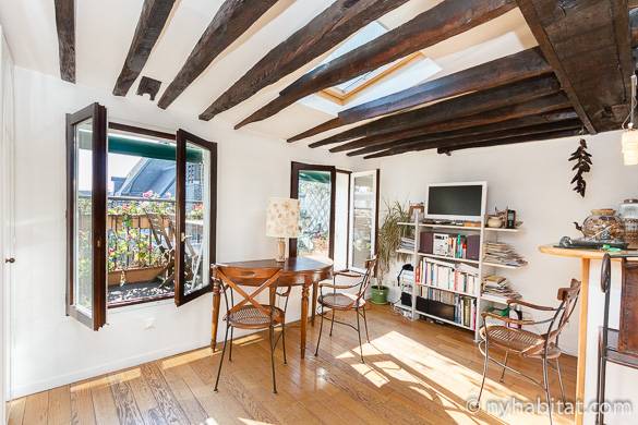 Image of living room of PA-2590 with exposed wood beam ceilings