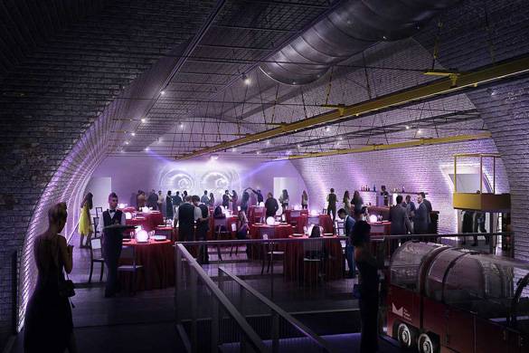 Image of dining tables in an underground railway tunnel