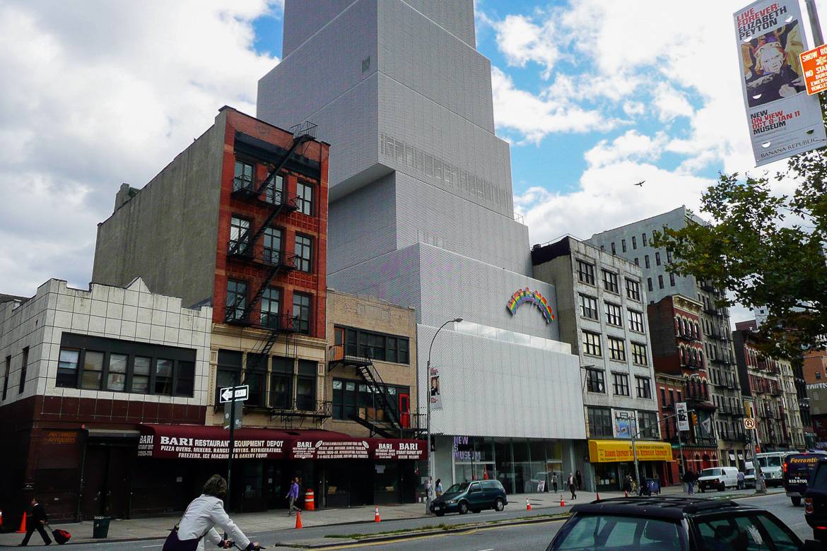 Image of the abstractly styled New Museum among the typical streetscape