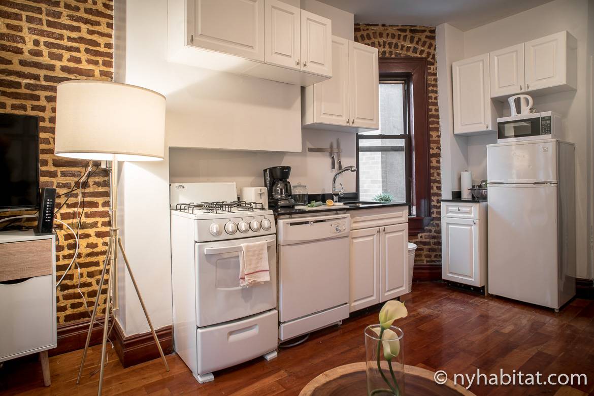 Image of kitchen of the NY-17254 apartment with exposed brick walls