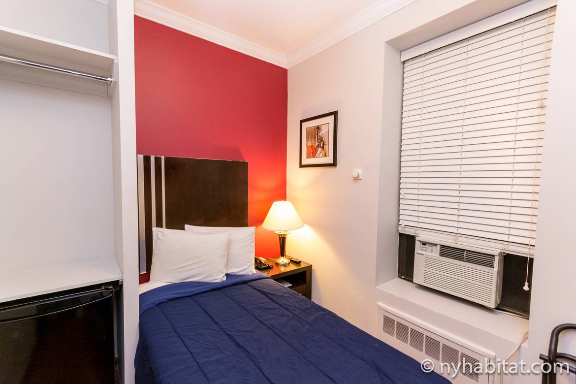 Image of a room with single bed in a dormitory-style building on the Upper West Side (NY15065)