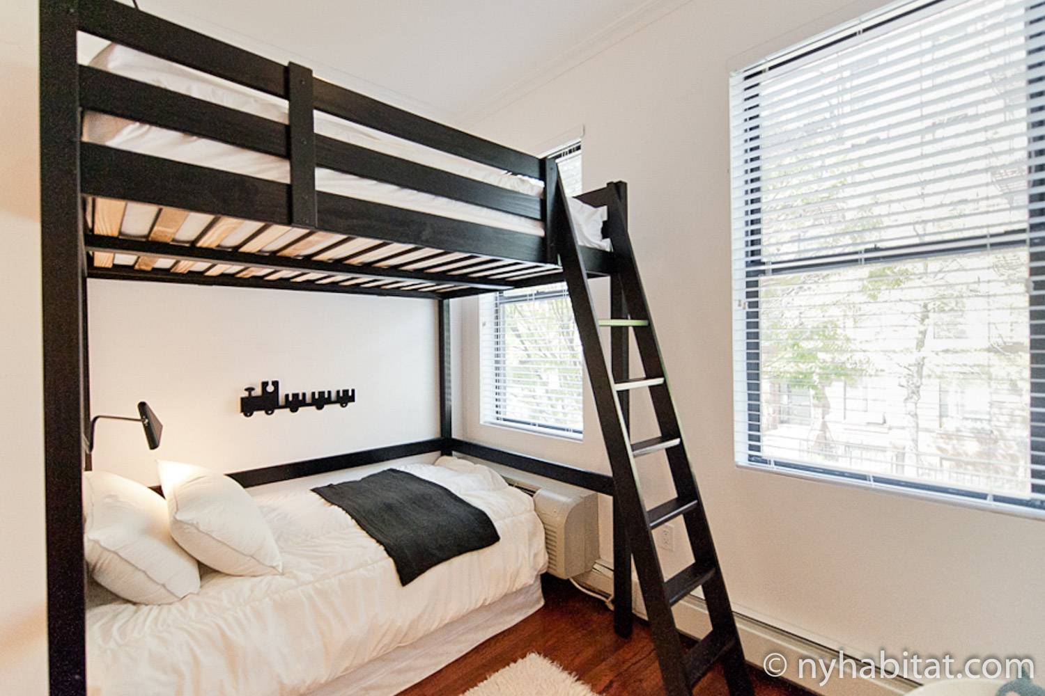 Image of bedroom 2 in NY-15593 with twin-sized bunk beds.