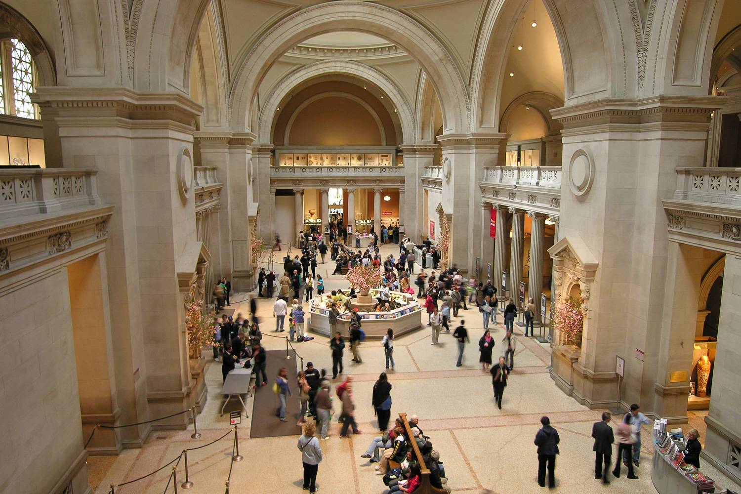 Image of the lobby area of the Metropolitan Museum of Art filled with guests.