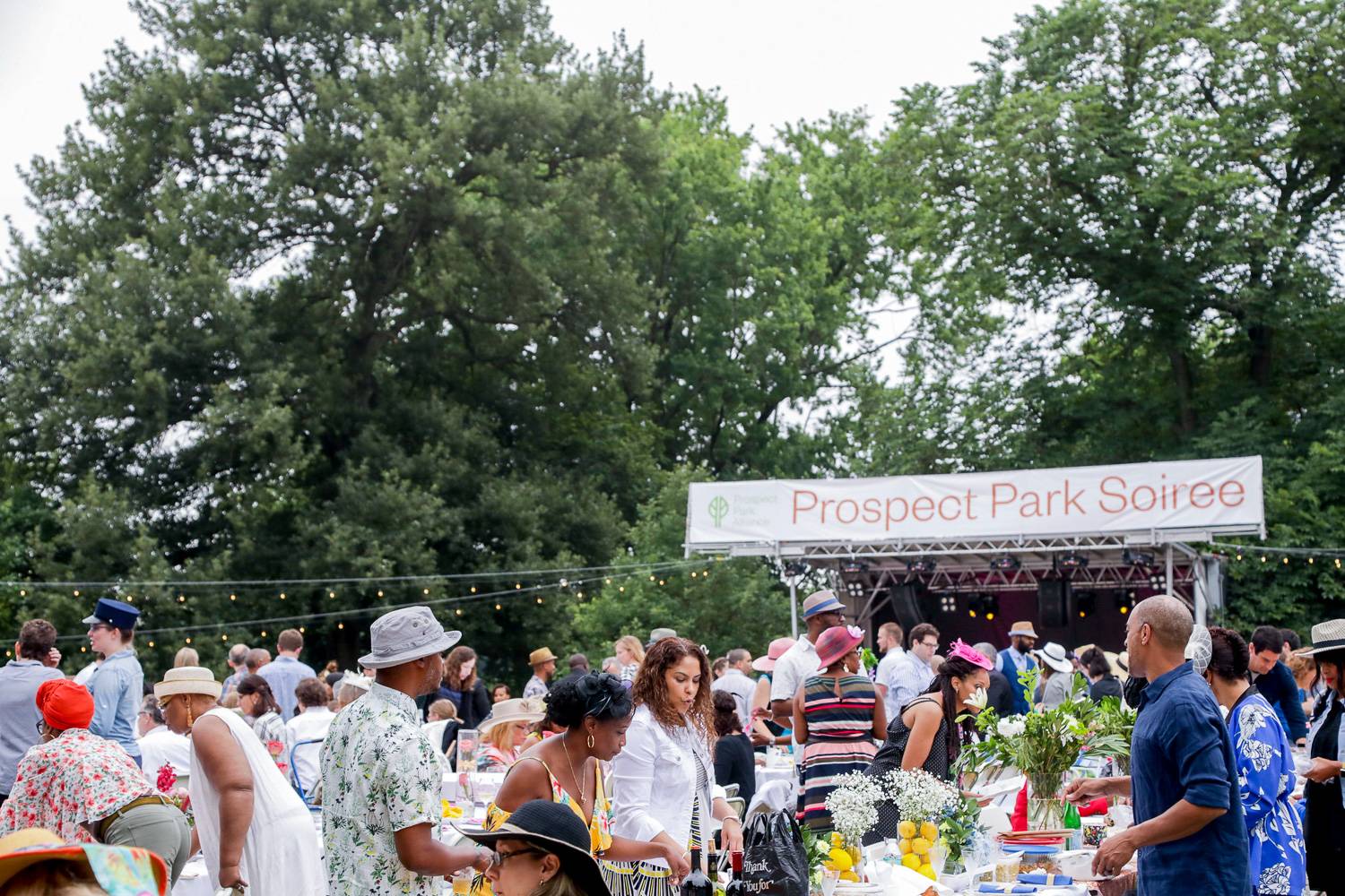 Image of guests at the Prospect Park Soiree in the summer.