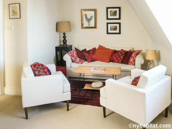 Image of living area in LN-70 with sofa and armchairs.