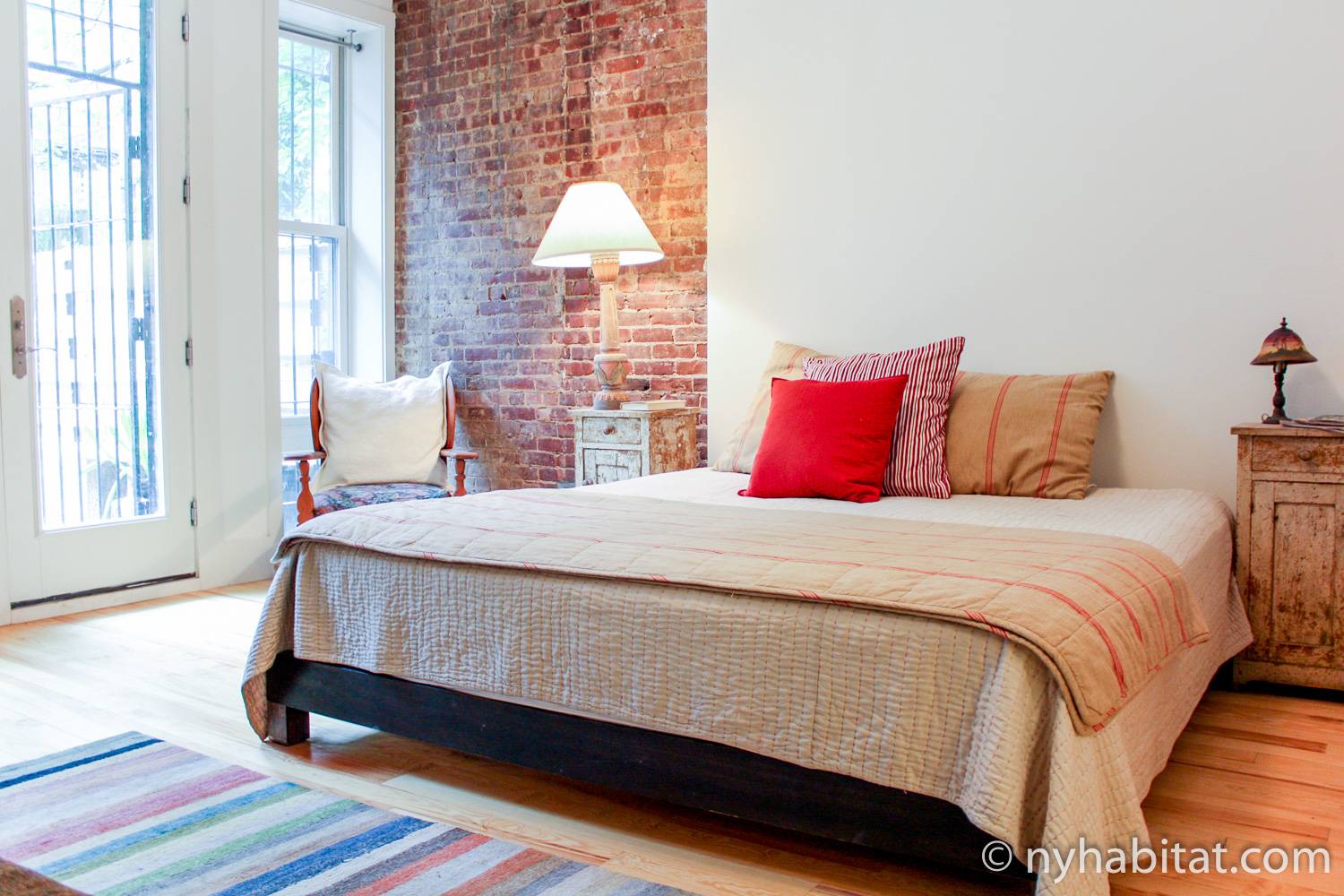 Image of bedroom in NY-14482 with king-sized bed.