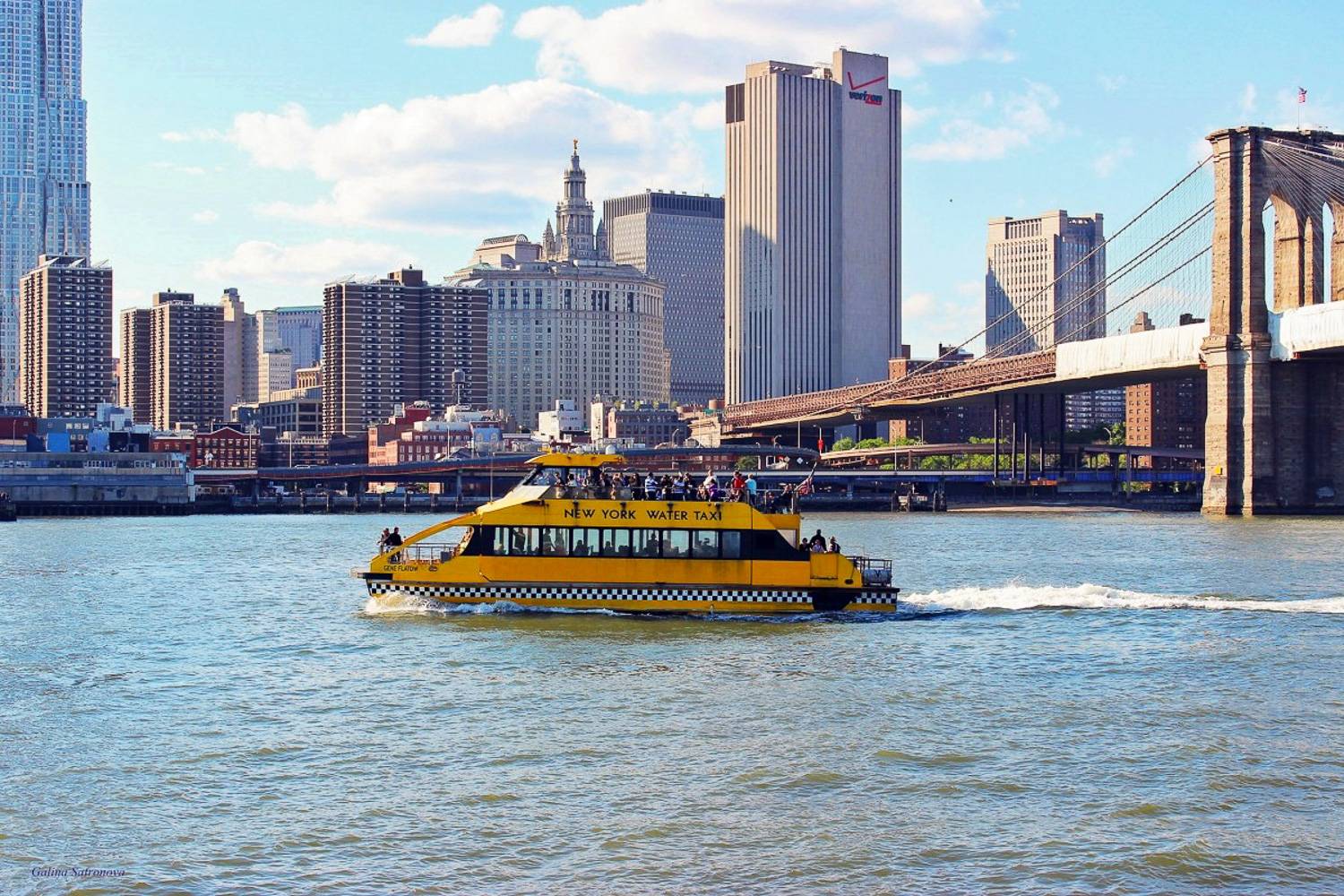 Image of a New York Water Taxi bringing tourists on a sightseeing cruise around Manhattan.