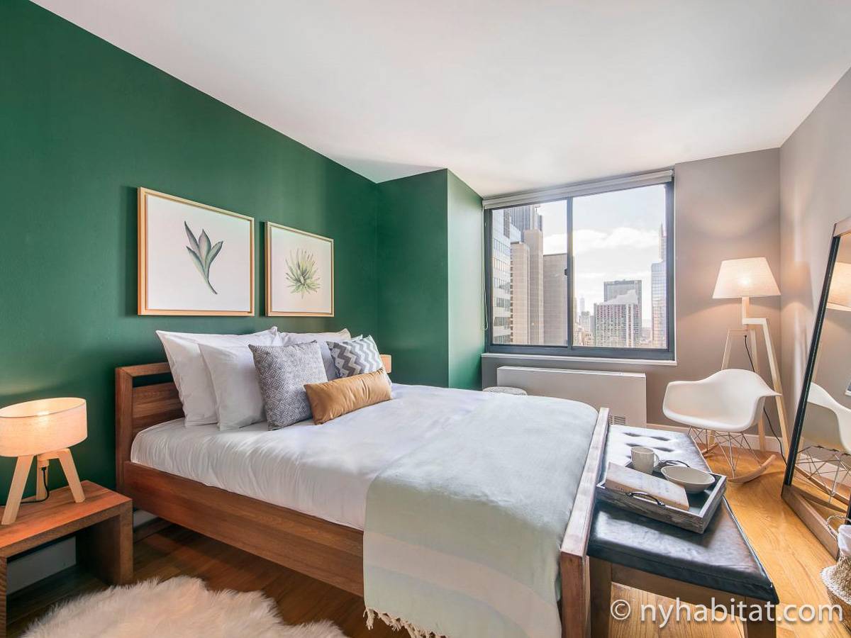 Stay near the Broadway Theater District in this two-bedroom furnished apartment in Midtown Manhattan. (Rental ID: NY- 17627)