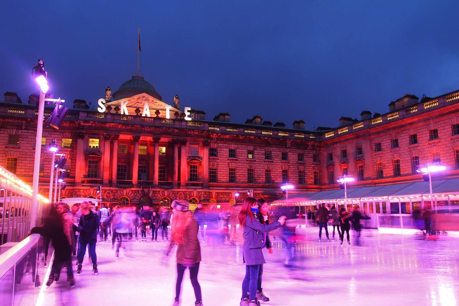 An image of Londoners ice skating at Somerset House.