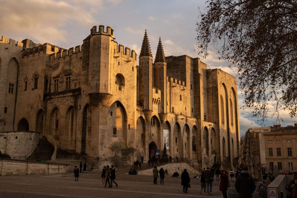 Avignon’s Palais des Papes or Palace of the Popes [Photo credit: Bingqian Li/Unsplash]