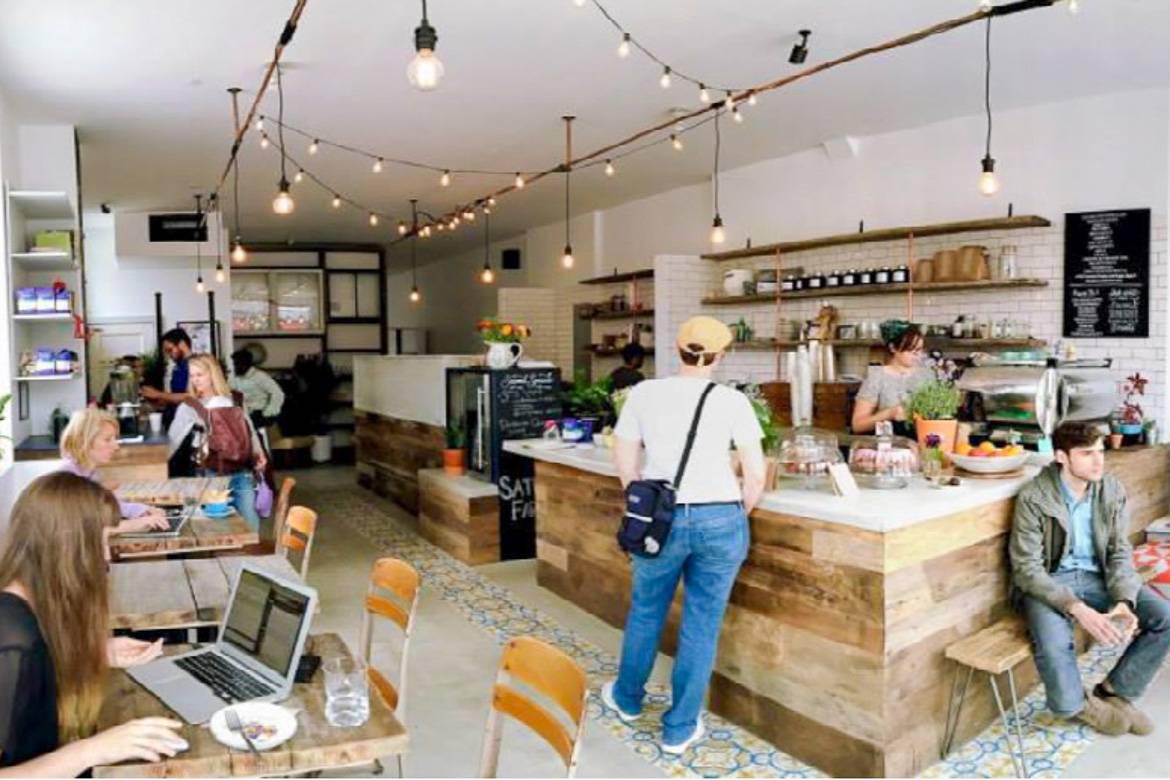 Immagine di persone sedute al computer da Stonefruit Espresso + Kitchen