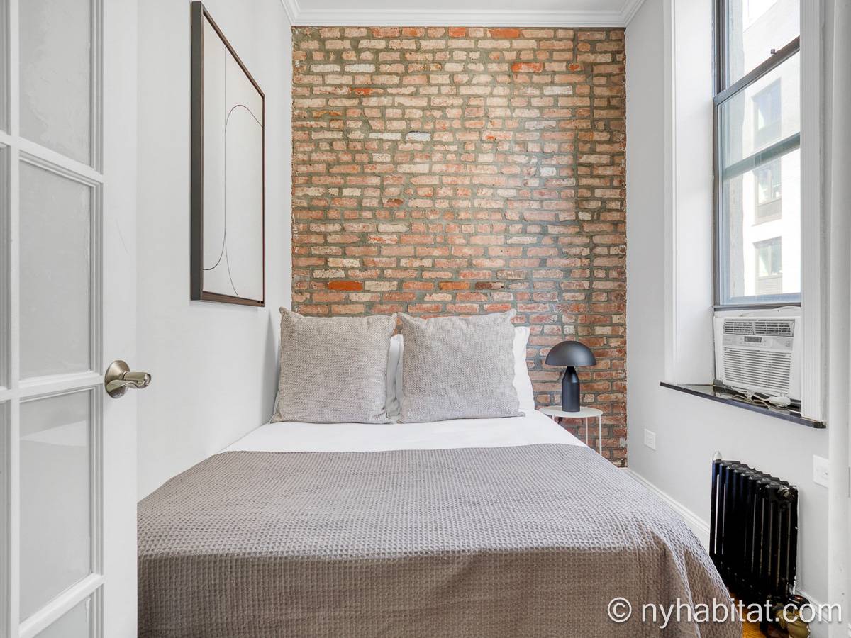 Schlafzimmer 2 - Photo 2 von 4