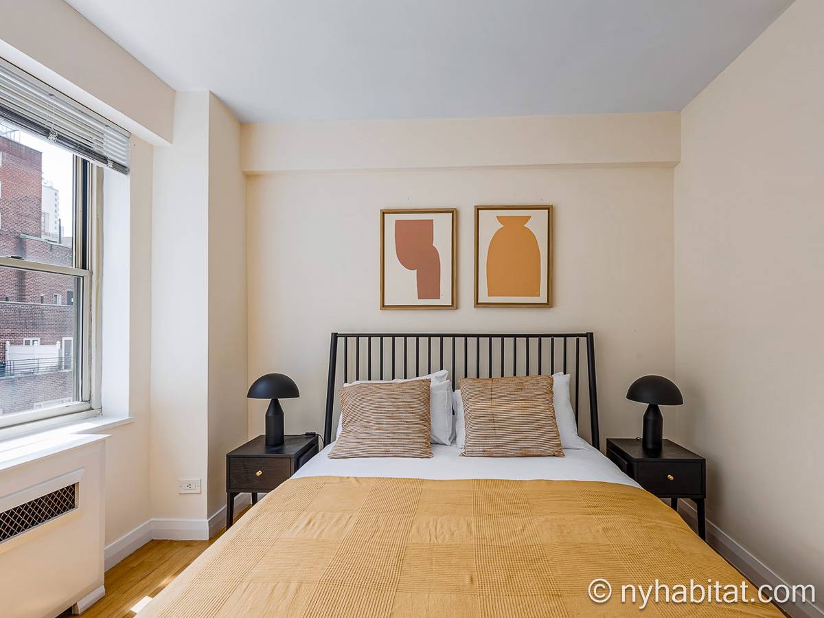 Schlafzimmer 2 - Photo 2 von 4