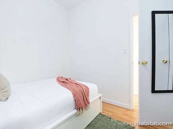 Schlafzimmer 2 - Photo 2 von 4