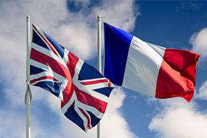 Imagen del Día de la Bastilla con las banderas de Francia y Reino Unido